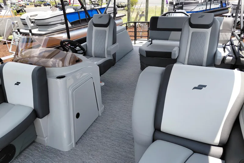 Slide: The Image of Luxurious interior of 2026 Starcraft EXS 1 Q DH pontoon boat with plush seating. - 41