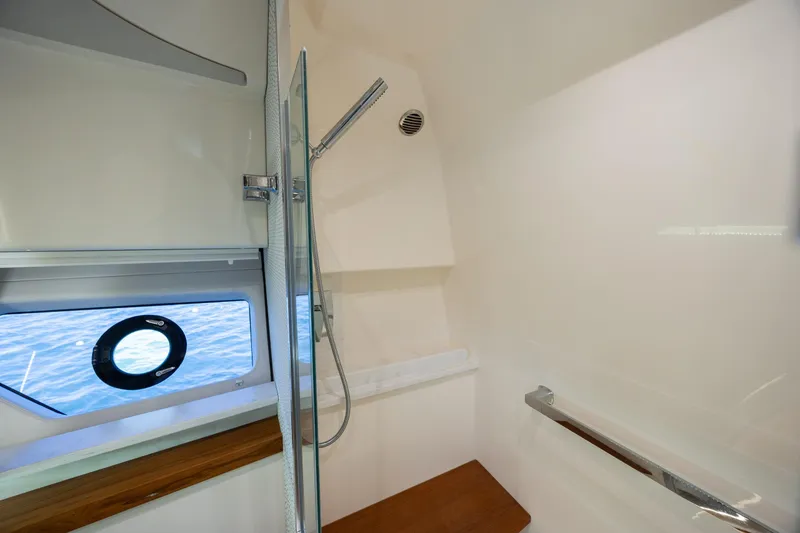 Slide: The Image of Luxurious bathroom interior of 2022 Tiara Yachts 43 LE with ocean view window. - 20