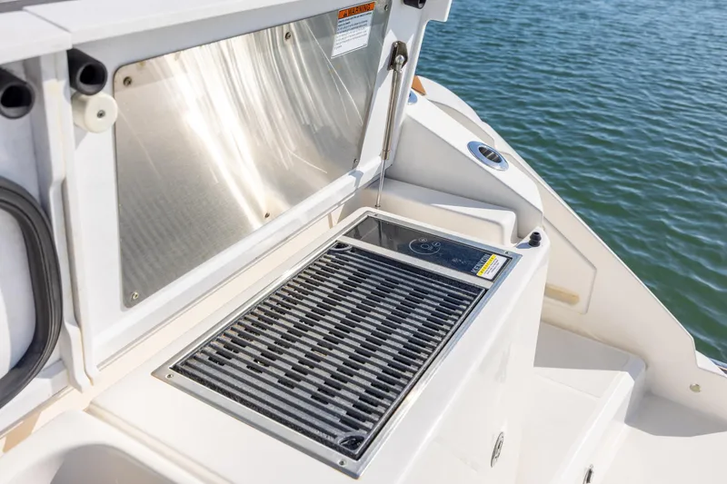 Slide: The Image of Outdoor grill on 2022 Tiara Yachts 43 LE, overlooking water. - 34