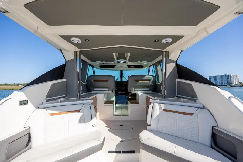 Slide: The Image of Luxurious interior of 2022 Tiara Yachts 43 LE, featuring elegant seating and modern design. - 39
