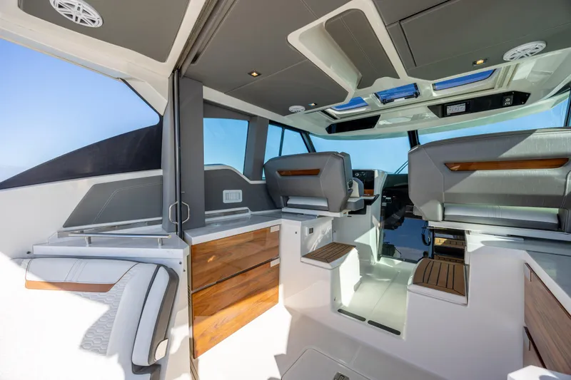 Slide: The Image of Luxurious interior of 2022 Tiara Yachts 43 LE, featuring sleek seating and modern design. - 40