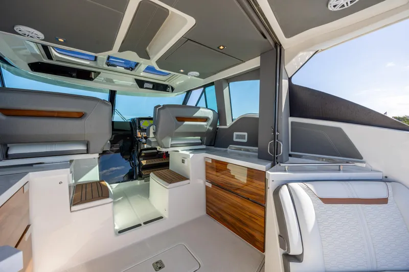 Slide: The Image of Luxurious interior of 2022 Tiara Yachts 43 LE, featuring modern seating and sleek design. - 41
