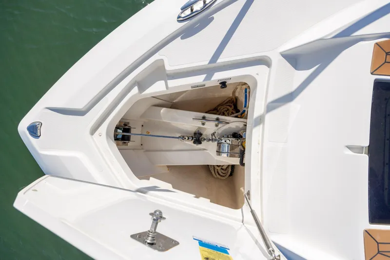 Slide: The Image of Anchor compartment of 2022 Tiara Yachts 43 LE, showcasing storage and equipment. - 71