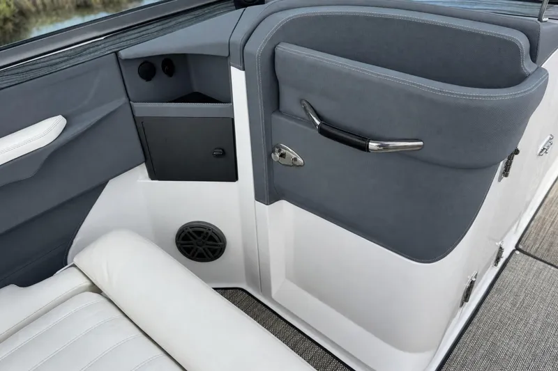 Slide: The Image of Interior of a 2016 Cobalt R5 boat, featuring sleek seating and modern design elements. - 16