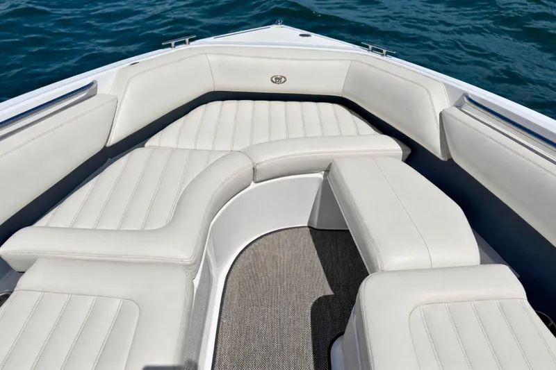 Slide: The Image of Luxurious seating on 2016 Cobalt R5 boat, featuring white upholstery and sleek design. - 22