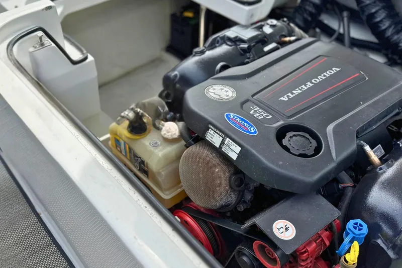 Slide: The Image of 2016 Cobalt R5 boat engine, featuring a Volvo Penta V8 350, in a clean compartment. - 25