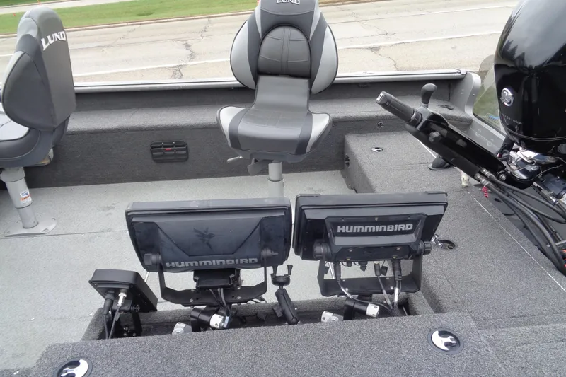 Slide: The Image of Interior of a 2011 Lund 2010 Pro Guide boat with Humminbird electronics. - 12