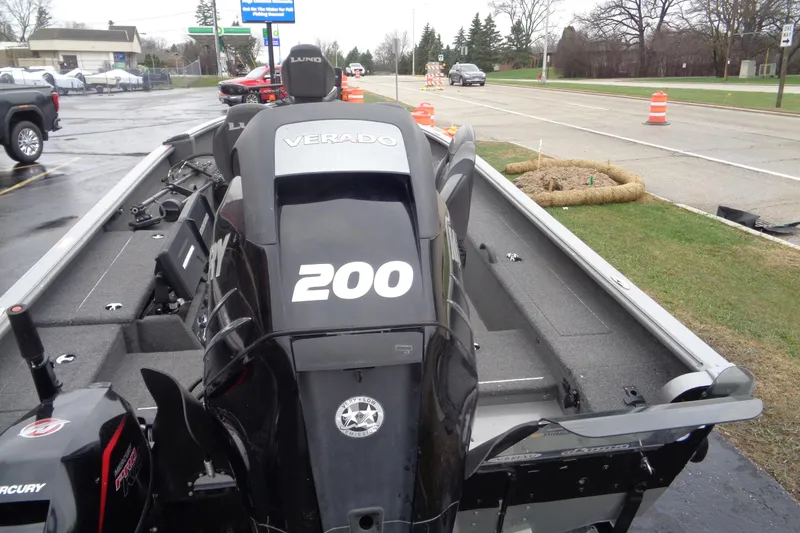 Slide: The Image of 2011 Lund 2010 Pro Guide boat with Mercury Verado 200 engine on a trailer. - 17