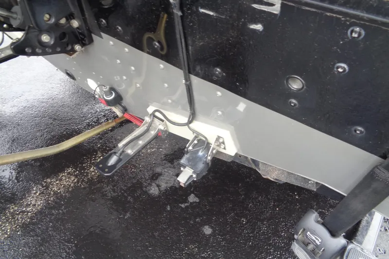 Slide: The Image of Rear view of a 2011 Lund 2010 Pro Guide boat with wiring and components. - 18