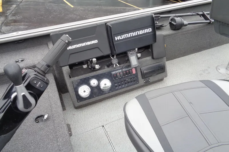 Slide: The Image of Control panel of a 2011 Lund 2010 Pro Guide boat with Humminbird electronics. - 21