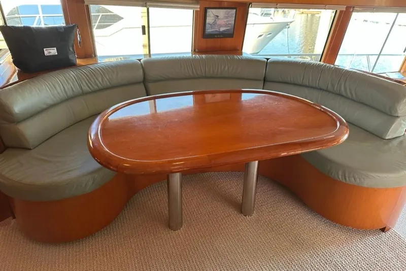Slide: The Image of Luxurious seating area on a 1999 Mikelson 64 Long Range Sportfish yacht. - 13