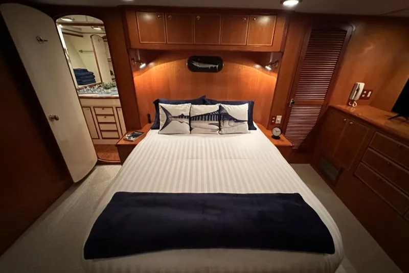 Slide: The Image of Luxurious cabin interior of 1999 Mikelson 64 Long Range Luxury Sportfish yacht. - 21