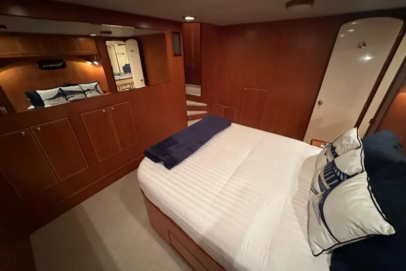 Slide: The Image of Luxurious cabin interior of a 1999 Mikelson 64 Long Range Luxury Sportfish yacht. - 25