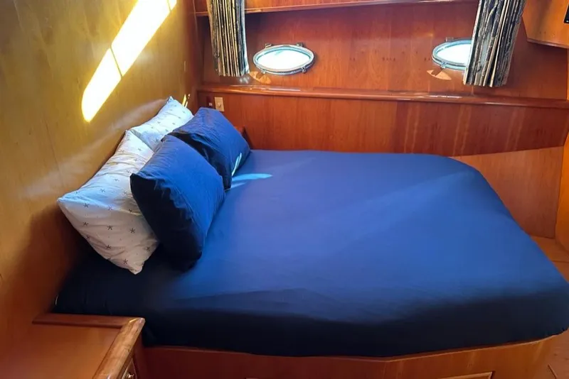 Slide: The Image of Luxurious cabin interior of 1999 Mikelson 64 Long Range Sportfish yacht. - 29
