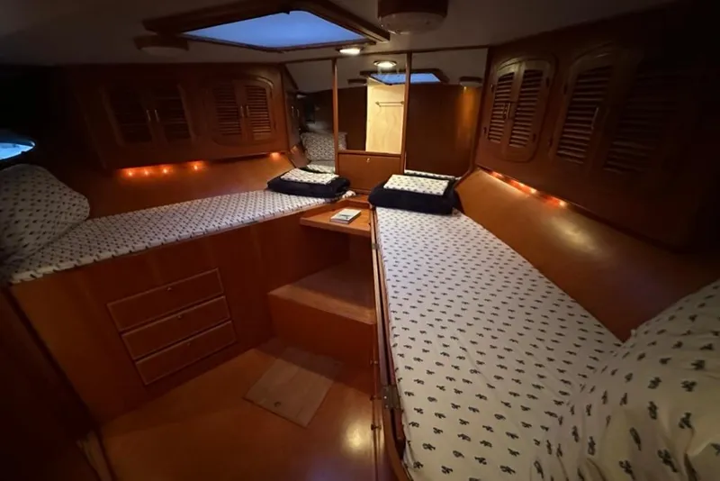 Slide: The Image of Interior cabin of 1999 Mikelson 64 Long Range Luxury Sportfish yacht with twin beds. - 38
