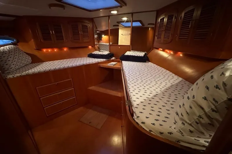 Slide: The Image of Luxurious cabin interior of 1999 Mikelson 64 Long Range Sportfish yacht. - 40
