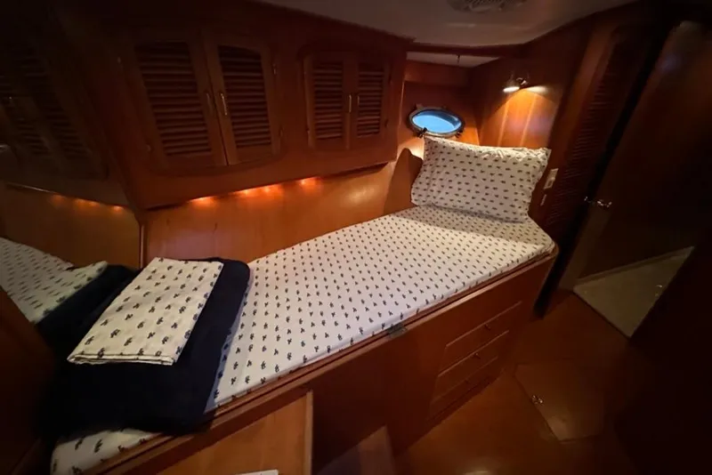 Slide: The Image of Luxurious cabin interior of 1999 Mikelson 64 Long Range Sportfish yacht. - 41