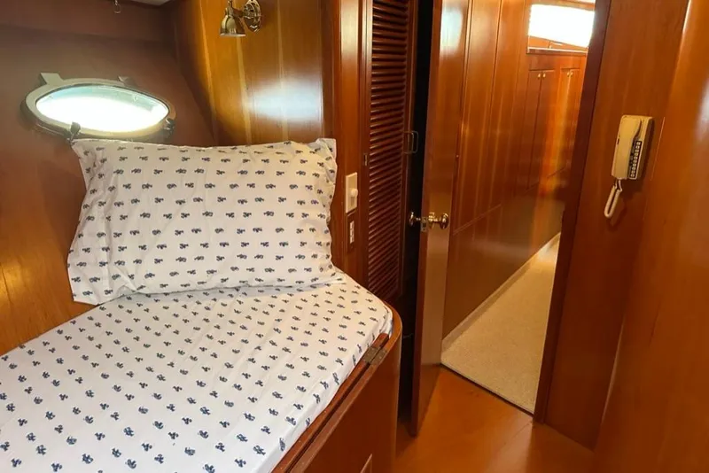 Slide: The Image of Cozy cabin interior of 1999 Mikelson 64 Long Range Luxury Sportfish yacht. - 43