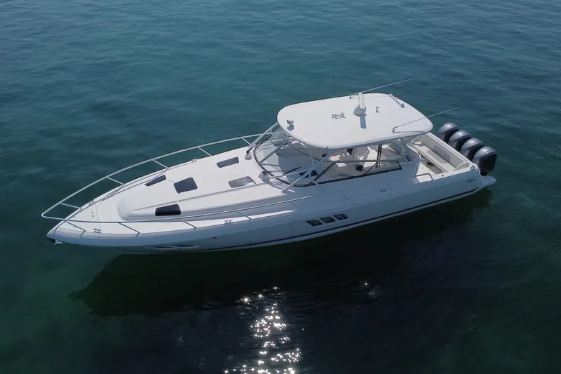 Slide: The Image of 2017 Intrepid 475 Sport Yacht on calm water, aerial view. - 5