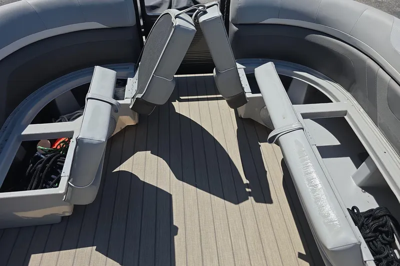 Slide: The Image of Interior view of a 2020 Bennington SX 22 SSLDX pontoon boat with gray seating. - 12