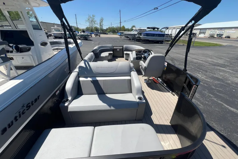Slide: The Image of 2020 Bennington SX 22 SSLDX pontoon boat with spacious seating and modern design. - 18