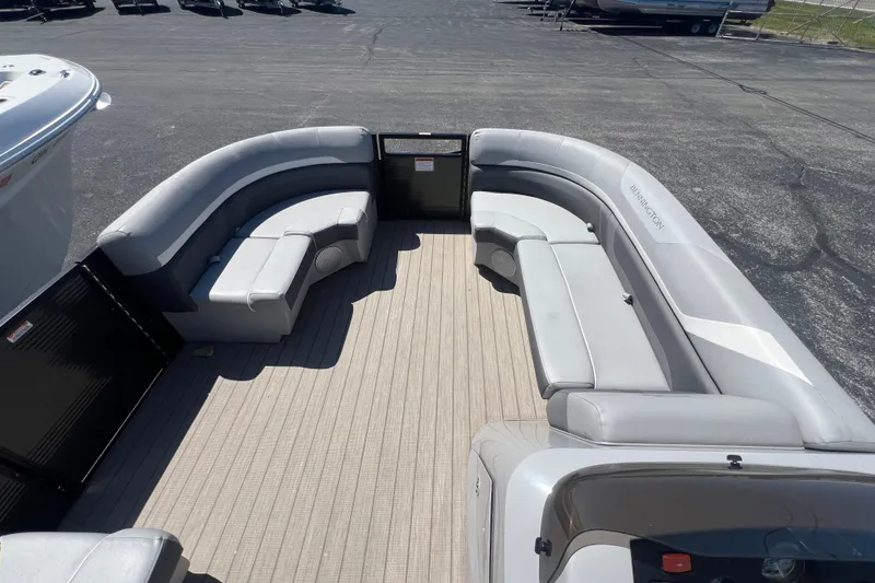 Slide: The Image of 2020 Bennington SX 22 SSLDX pontoon boat with spacious seating and sleek design. - 22