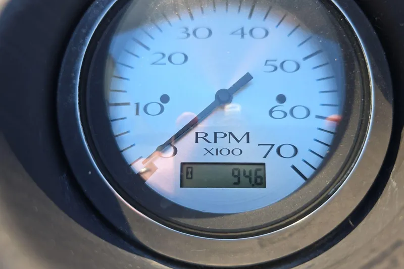 Slide: The Image of Close-up of a Bennington SX 22 SSLDX 2020 RPM gauge displaying 946 RPM. - 8