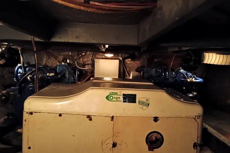 Slide: The Image of Engine room of a 1978 Californian LRC boat with Onan generator. - 33