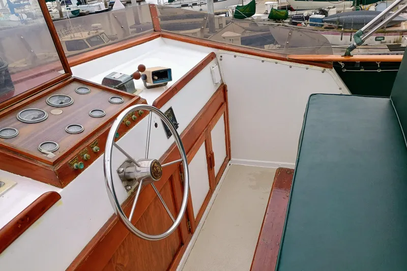 Slide: The Image of 1978 Californian LRC boat helm with vintage controls and steering wheel. - 8