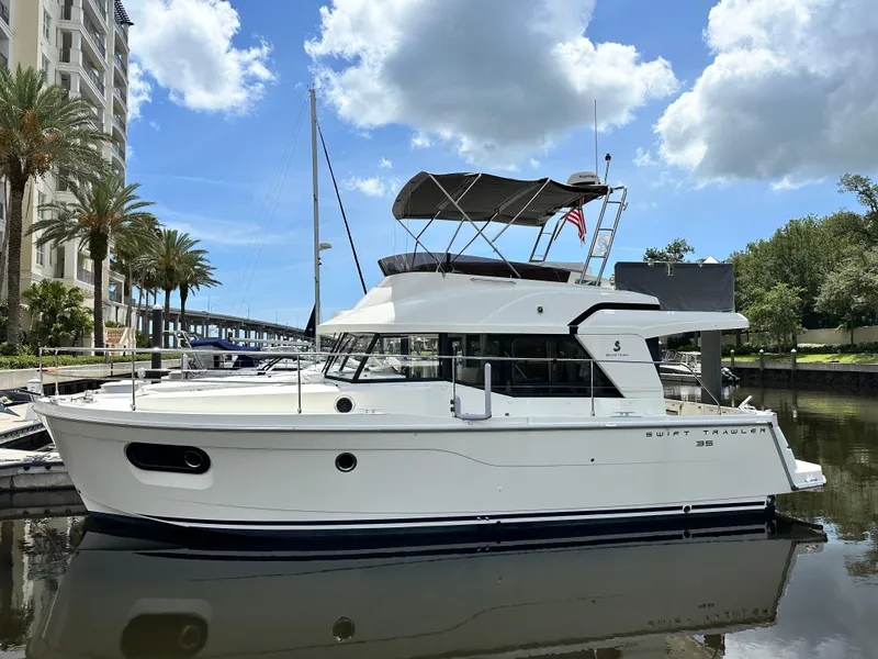 The Image of 2022 Beneteau Swift Trawler 35 docked, featuring sleek design and modern amenities. - 0