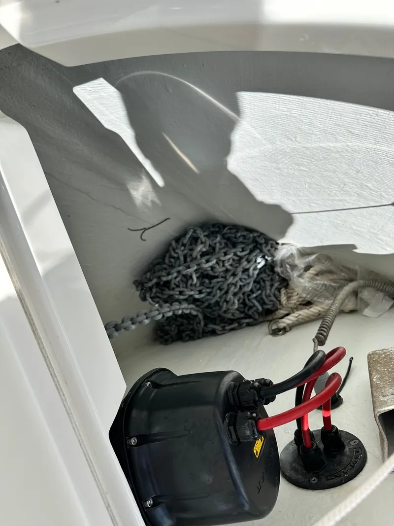 Slide: The Image of Anchor chain and electrical components on 2022 Beneteau Swift Trawler 35 boat. - 23