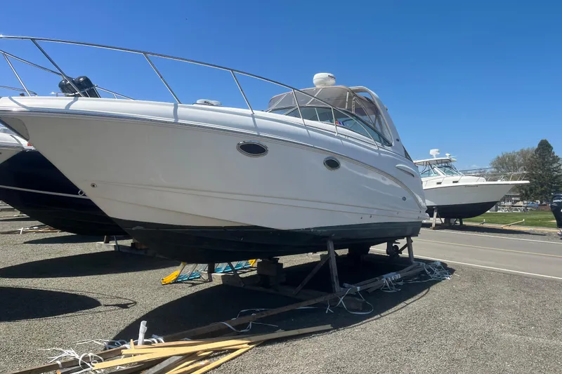 Slide: The Image of 2005 CHAPPARAL 290 SIGNATURE boat on dry dock under clear blue sky. - 4