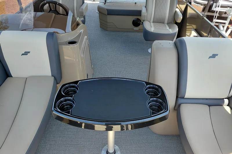 Slide: The Image of Interior of 2026 Starcraft EXS 3 Q DH pontoon boat with seating and table. - 15