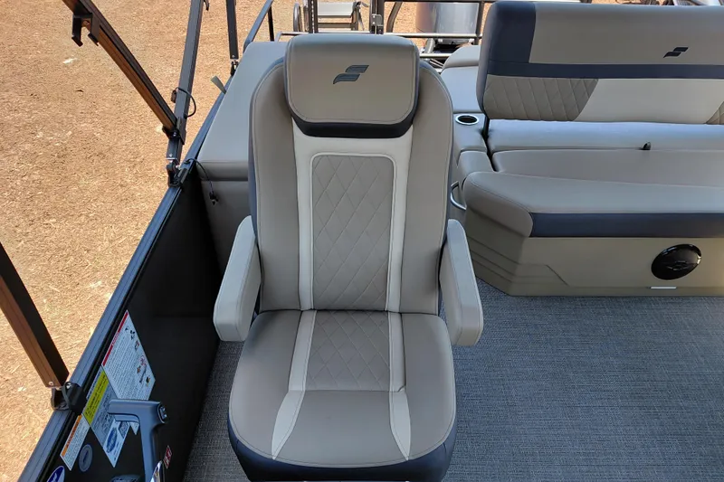 Slide: The Image of Captain's chair on 2026 Starcraft EXS 3 Q DH boat, featuring elegant upholstery and design. - 27