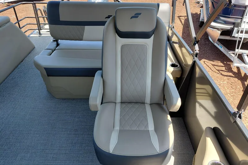 Slide: The Image of Luxurious seating on 2026 Starcraft EXS 3 Q DH boat, featuring elegant upholstery and design. - 28