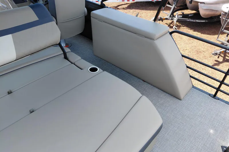 Slide: The Image of 2026 Starcraft EXS 3 Q DH boat interior with beige seating and flooring. - 33