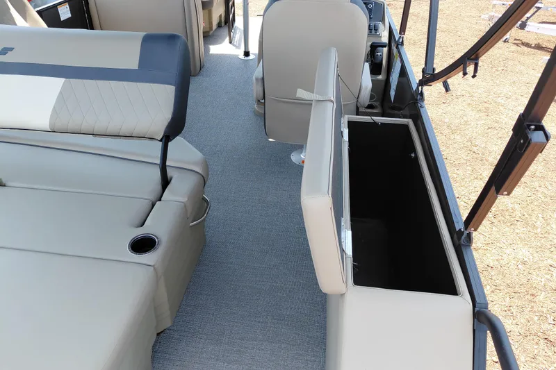 Slide: The Image of Interior of 2026 Starcraft EXS 3 Q DH boat with seating and storage compartment. - 34