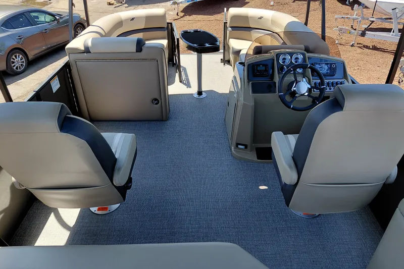 Slide: The Image of Interior of 2026 Starcraft EXS 3 Q DH boat with modern seating and control panel. - 38