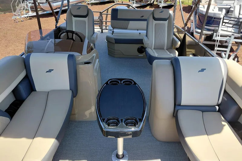 Slide: The Image of Interior of 2026 Starcraft EXS 3 Q DH pontoon boat with luxurious seating and table. - 41