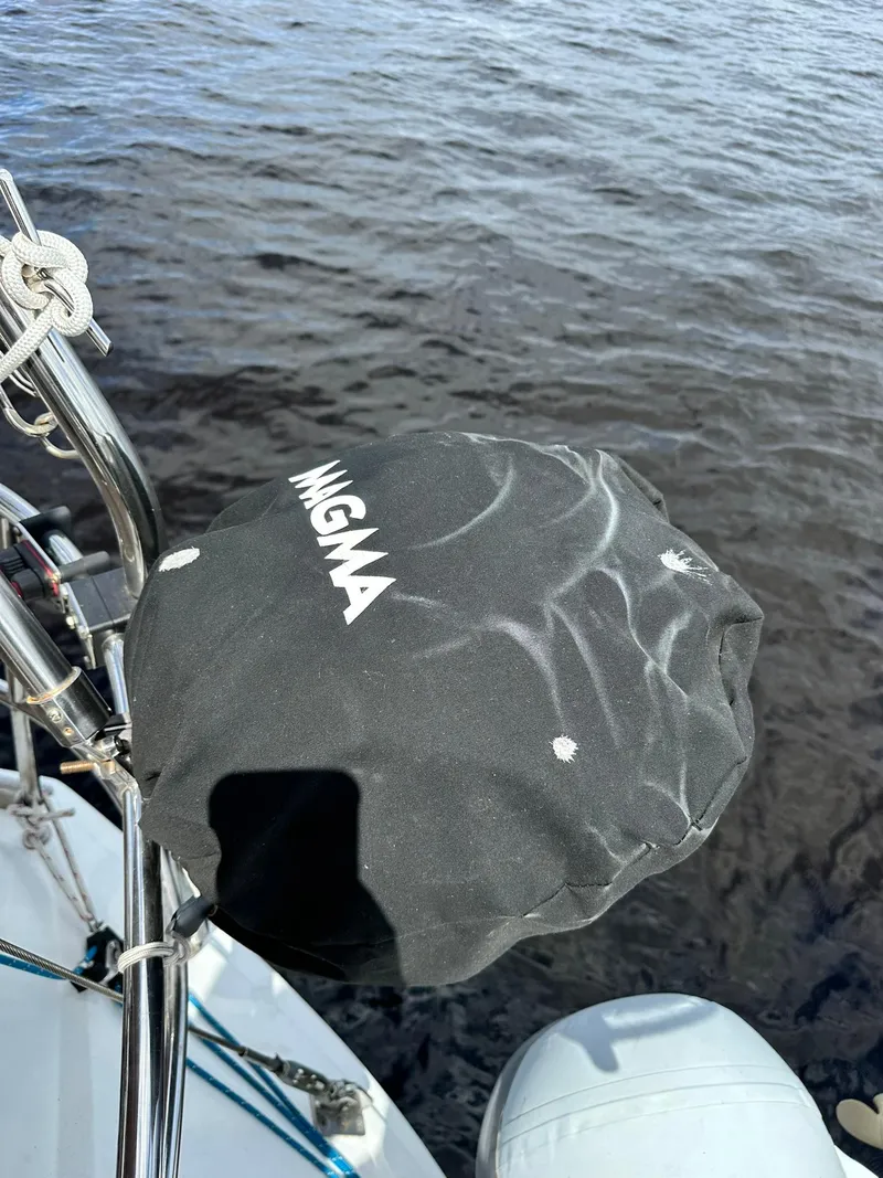 Slide: The Image of Jeanneau Sun Odyssey 45 DS 2011 with Magma grill cover on deck, near water. - 40
