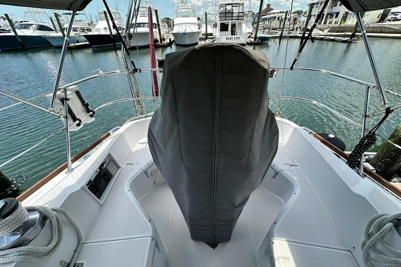 Slide: The Image of 2007 Sabre 386 sailboat cockpit with covered helm, docked in marina. - 30