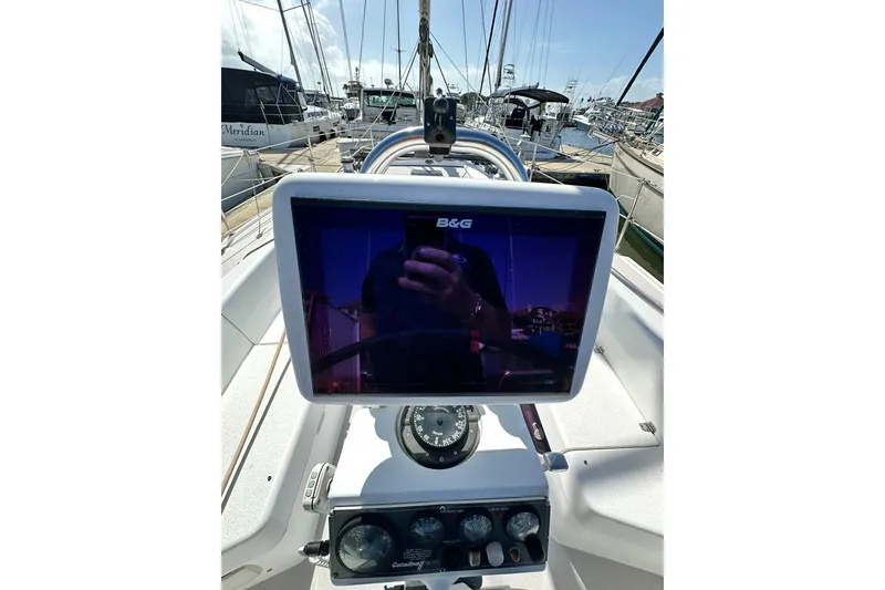Slide: The Image of Cockpit of 2008 Catalina 320 sailboat with B&G navigation display. - 32