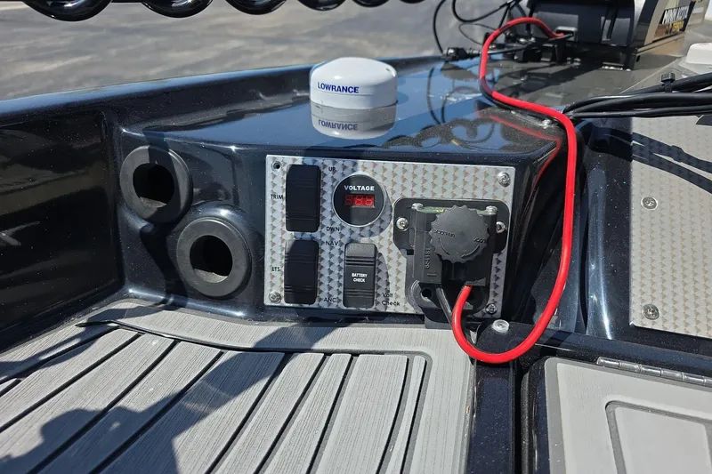 Slide: The Image of Control panel of 2026 Yar-Craft 219TFX boat with voltage display and wiring. - 16