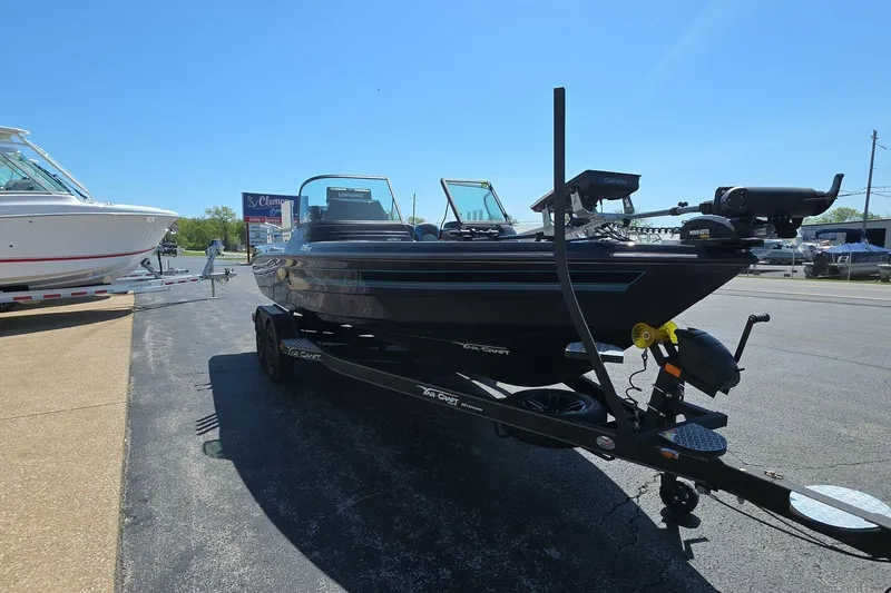Slide: The Image of 2026 Yar-Craft 219TFX boat on trailer in outdoor dealership lot. - 2