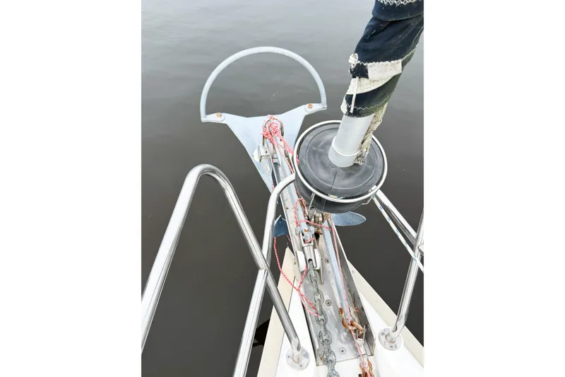 Slide: The Image of Bow of 1996 Hunter 430 sailboat with anchor and rigging details. - 19