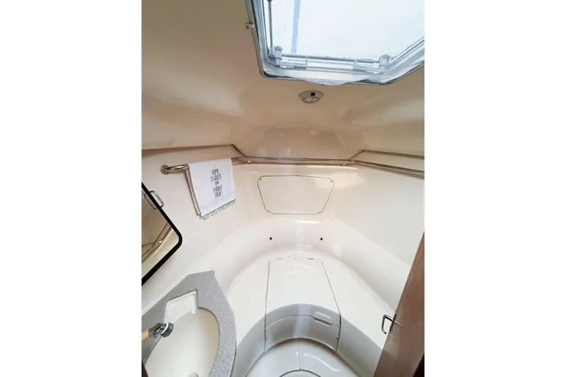 Slide: The Image of Interior of 1996 Hunter 430 yacht bathroom with skylight and sink. - 43