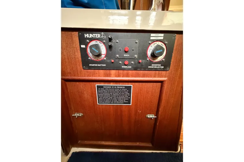 Slide: The Image of Control panel of a 1996 Hunter 430 sailboat with battery and inverter selectors. - 59