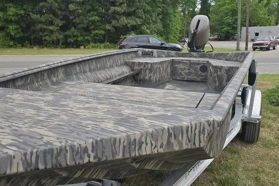Slide: The Image of 2026 Havoc 1760 VJST boat with camouflage design on a trailer. - 10