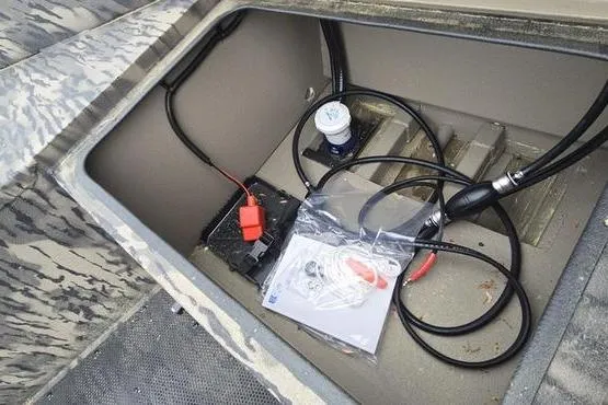 Slide: The Image of Storage compartment of 2026 Havoc 1760 VJST boat with wiring and accessories. - 11