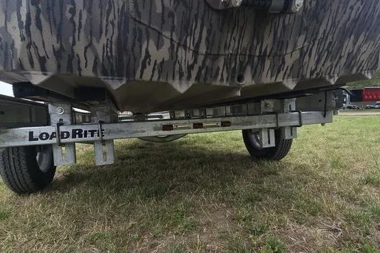 Slide: The Image of Trailer supporting a 2026 Havoc 1760 VJST boat on grass. - 4